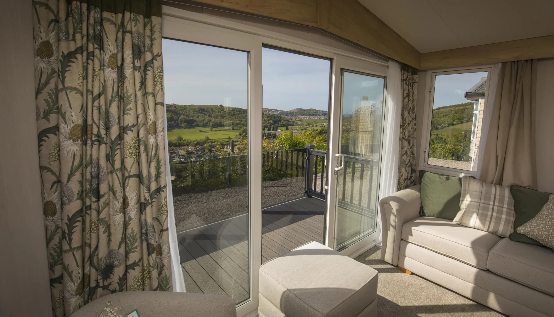 Swift Moselle interior lounge with large windows and valley views.